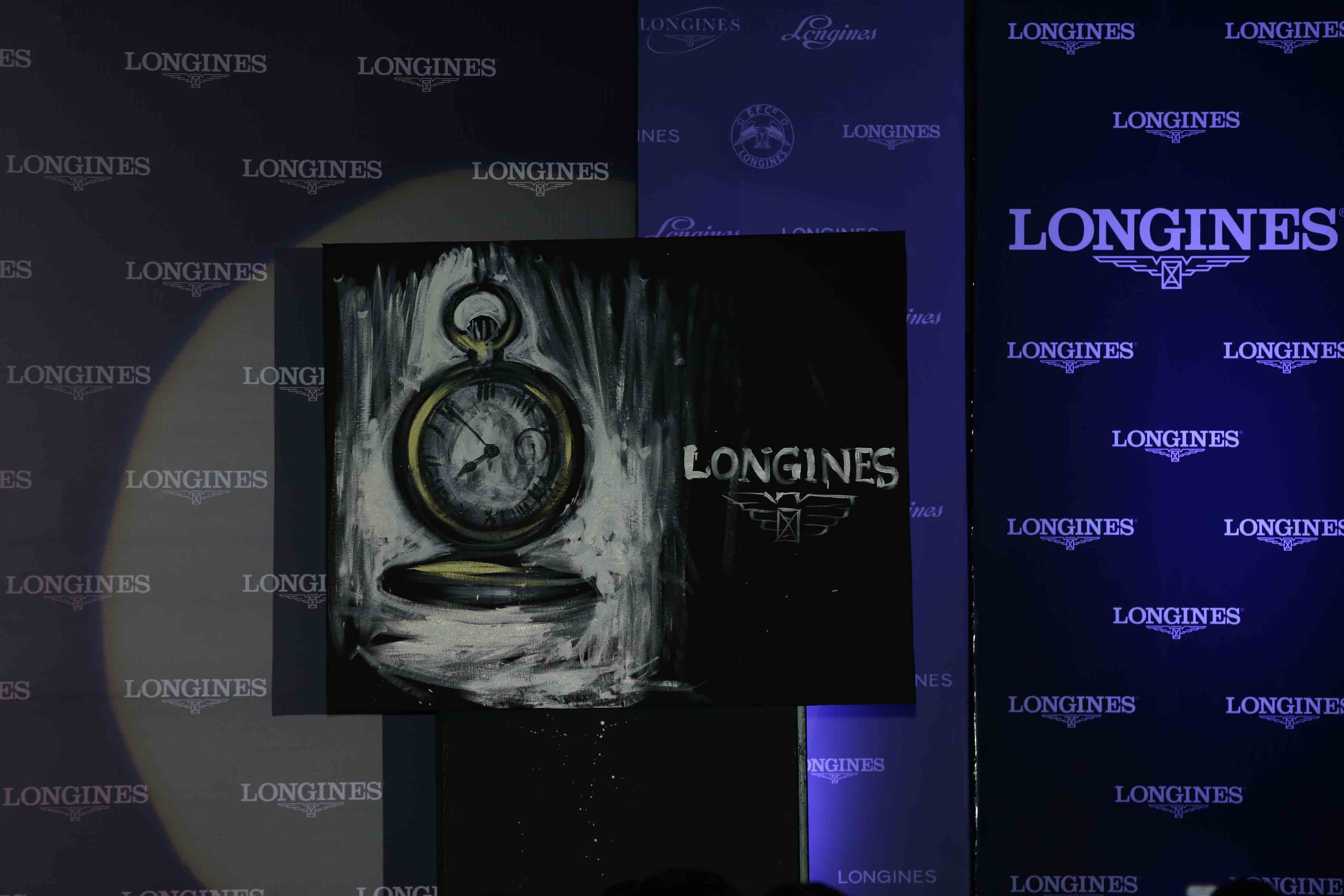Villas Nayak, Speed painter, with his Painting of the winning watch at Longines event