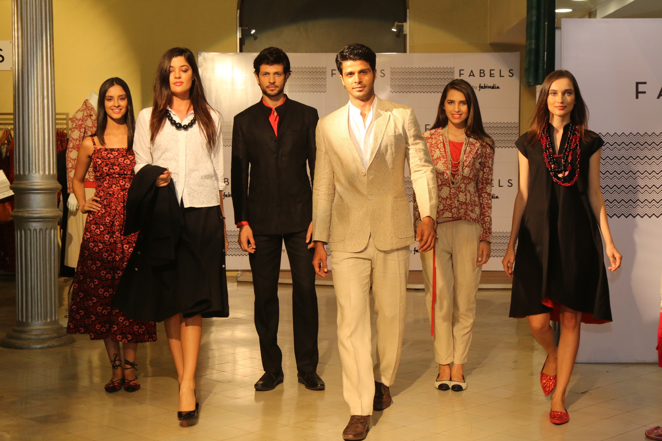 Models walking with FABELS outfits